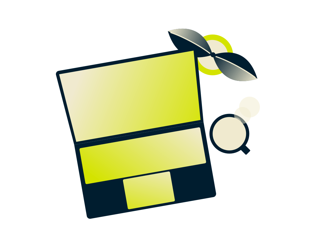 Prijenosno računalo s biljkom i pićem.